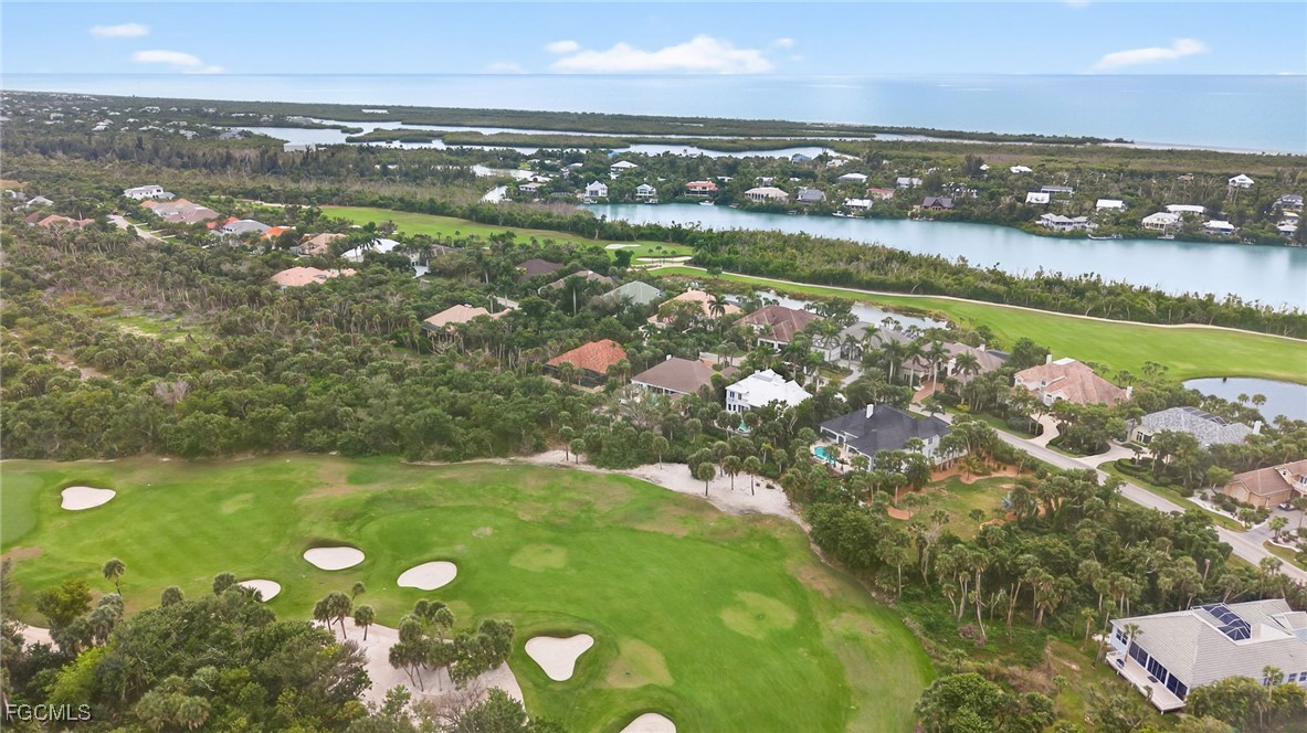 2388 Wulfert Road Sanibel, FL 33957 - Photo 47 of 50 an aerial view of ocean residential houses with outdoor space and swimming pool