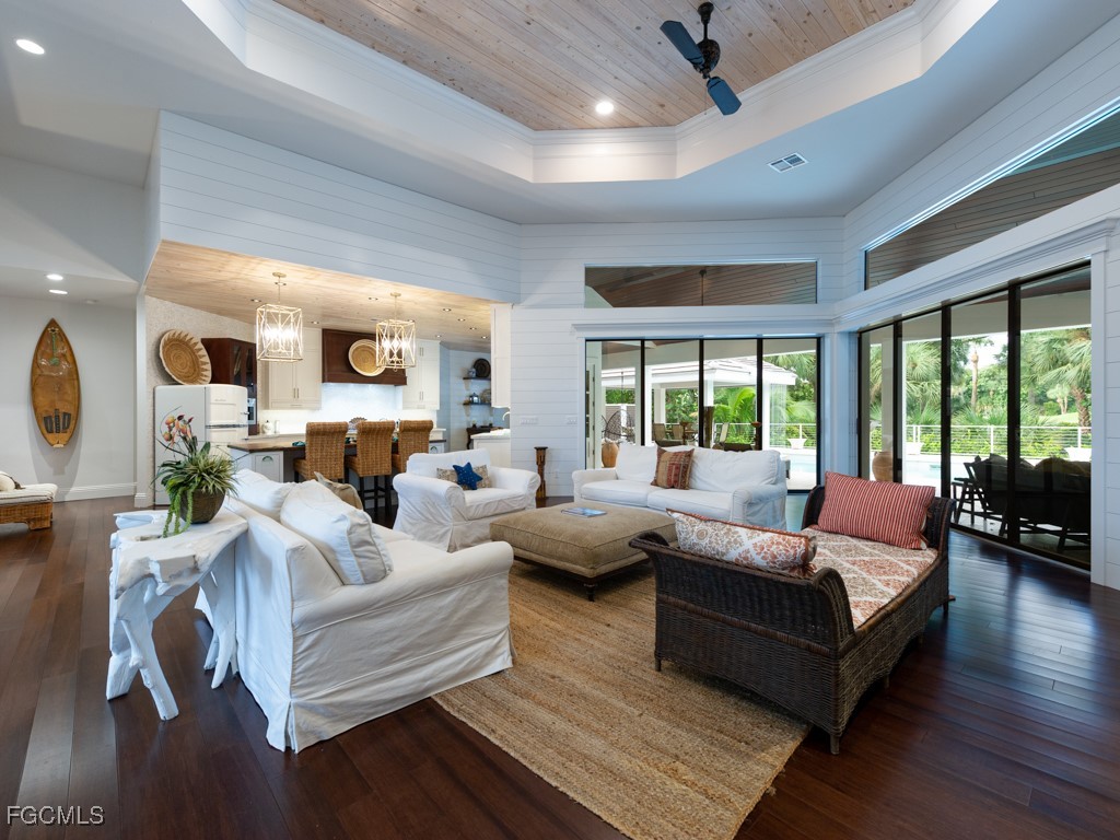 2388 Wulfert Road Sanibel, FL 33957 - Photo 5 of 49 a living room with furniture and a large window