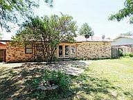 5424 45th Street Lubbock, TX 79414 - Photo 16 of 16 a view of a house with a tree in the background