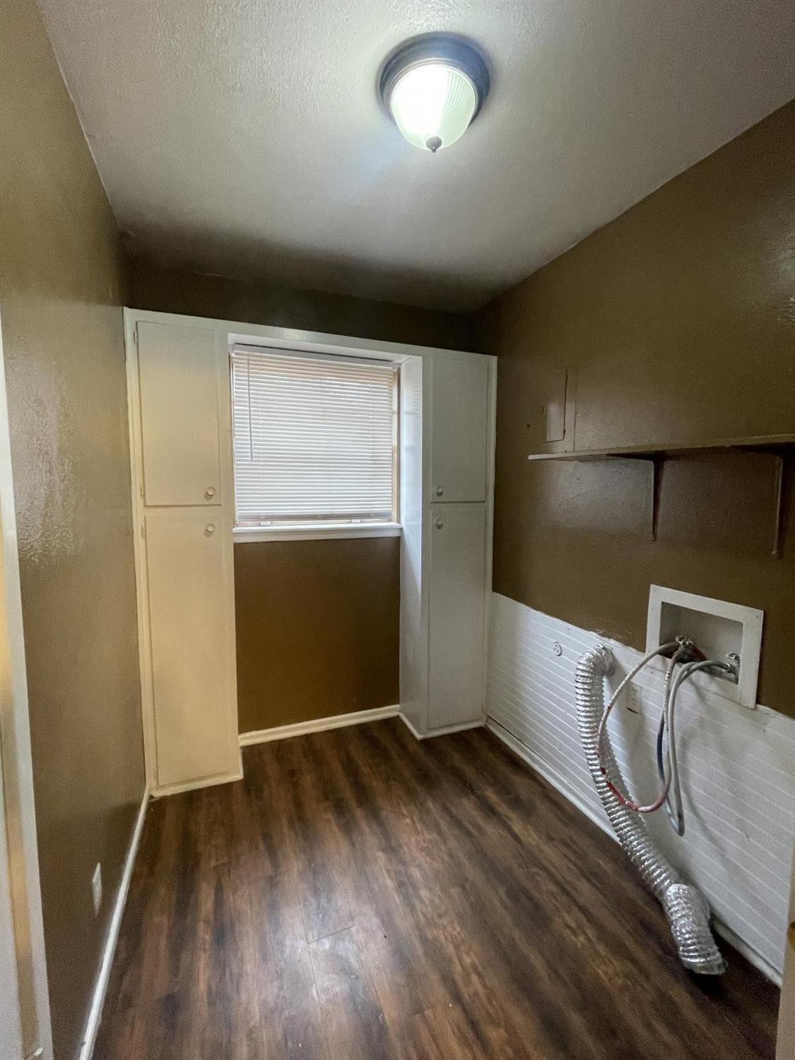 5424 45th Street Lubbock, TX 79414 - Photo 9 of 16 wooden floor in an empty room