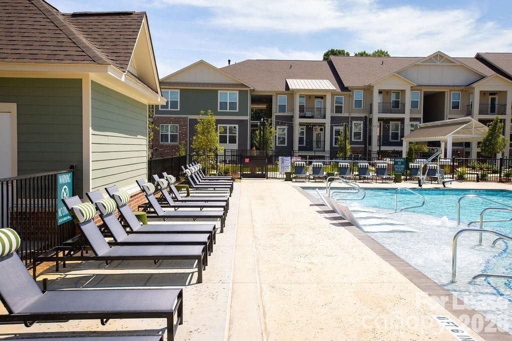102 Kennedy Rdg Way, Unit ALEXANDER Mooresville, NC 28115 - Photo 21 of 37 a view of house with outdoor seating