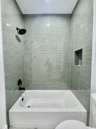 a bathroom with a bathtub