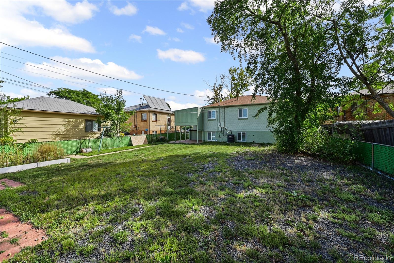 2245 Ames Street Edgewater, CO 80214 - Photo 12 of 21 a house view with a garden space