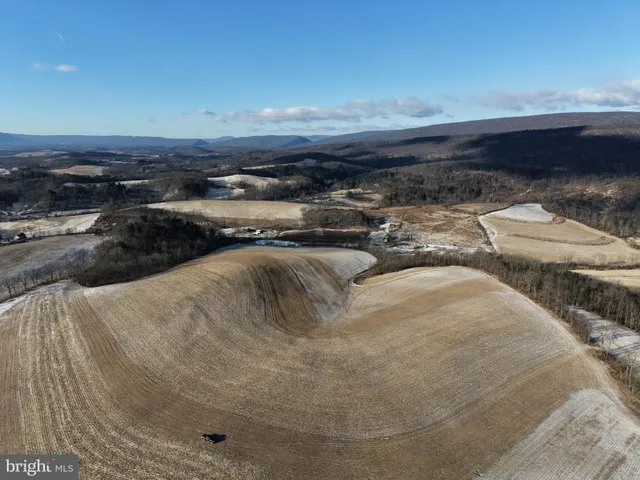 a view of a ocean with beach