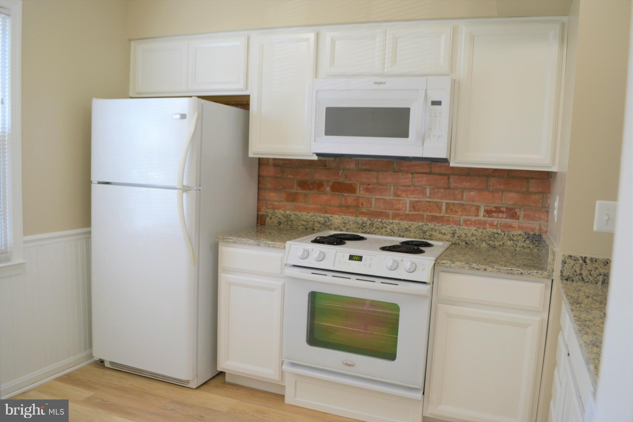 8540 Milford Court, Unit 897 Springfield, VA 22152 - Photo 6 of 30 Kitchen - Main Floor