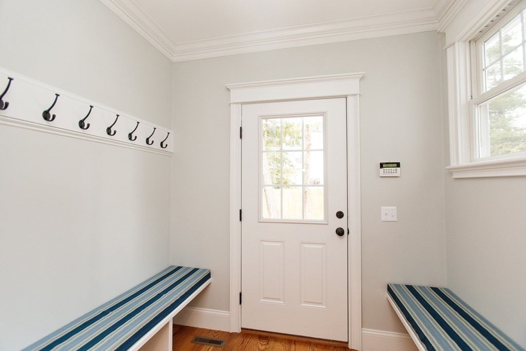 4 Ingersoll Road Wellesley, MA 02481 - Photo 18 of 26 a view of an empty room with wooden floor and a window