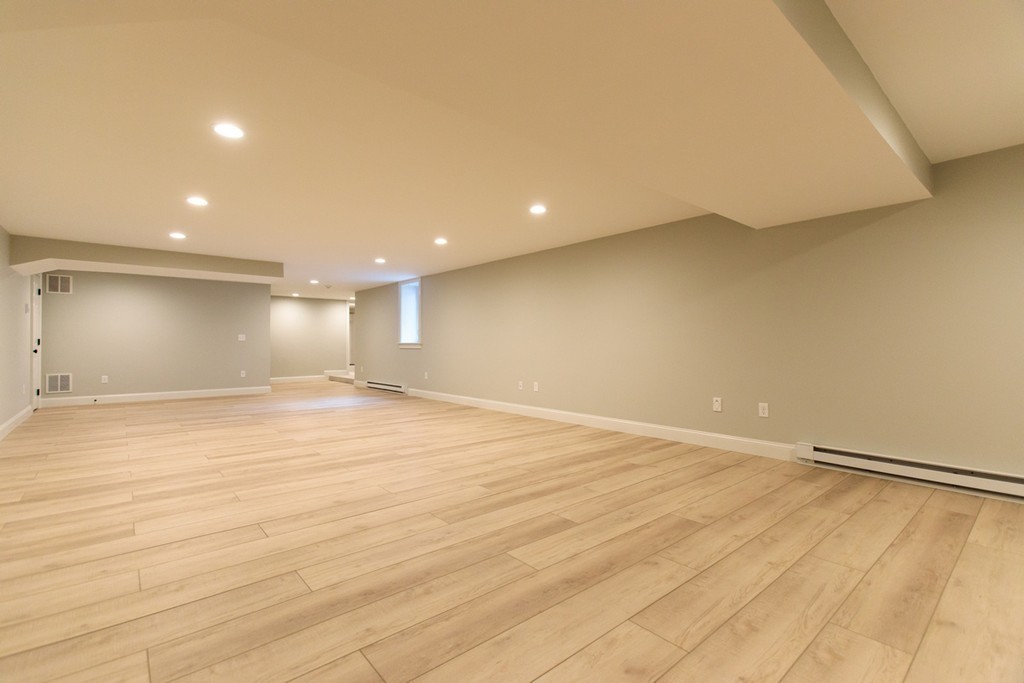 4 Ingersoll Road Wellesley, MA 02481 - Photo 23 of 26 a view of an empty room with wooden floor