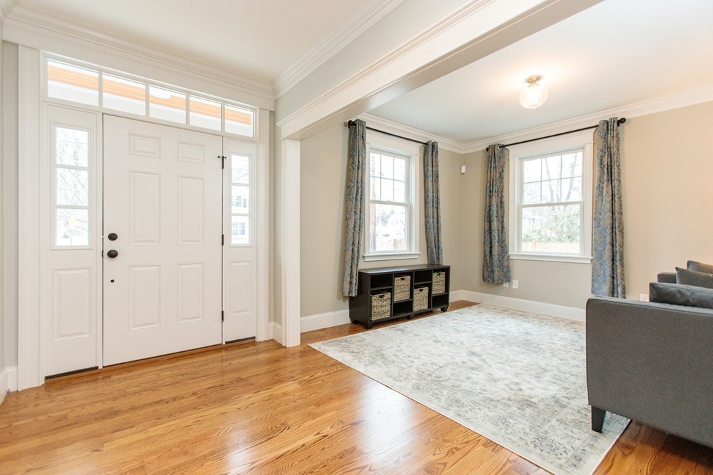 4 Ingersoll Road Wellesley, MA 02481 - Photo 4 of 26 a spacious bedroom with a large bed and a window