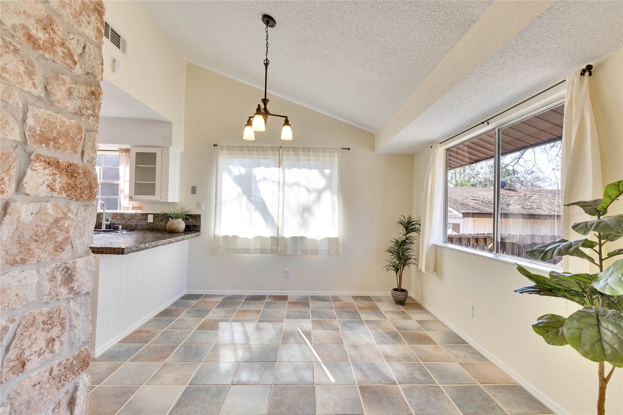 1002 Bodark Lane Austin, TX 78745 - Photo 14 of 35 a view of a kitchen with a large window