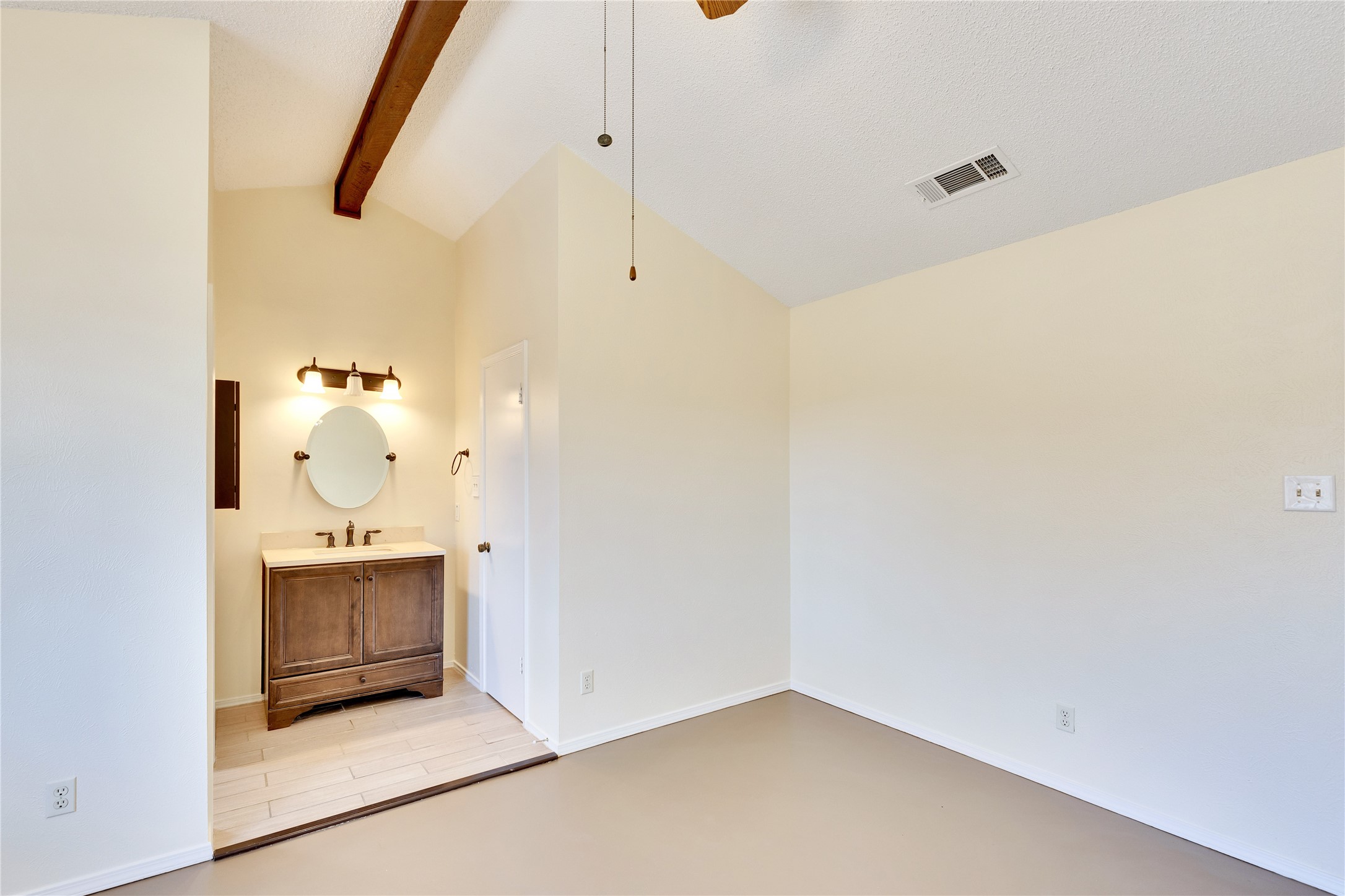 1002 Bodark Lane Austin, TX 78745 - Photo 17 of 35 a bathroom with a sink and mirror