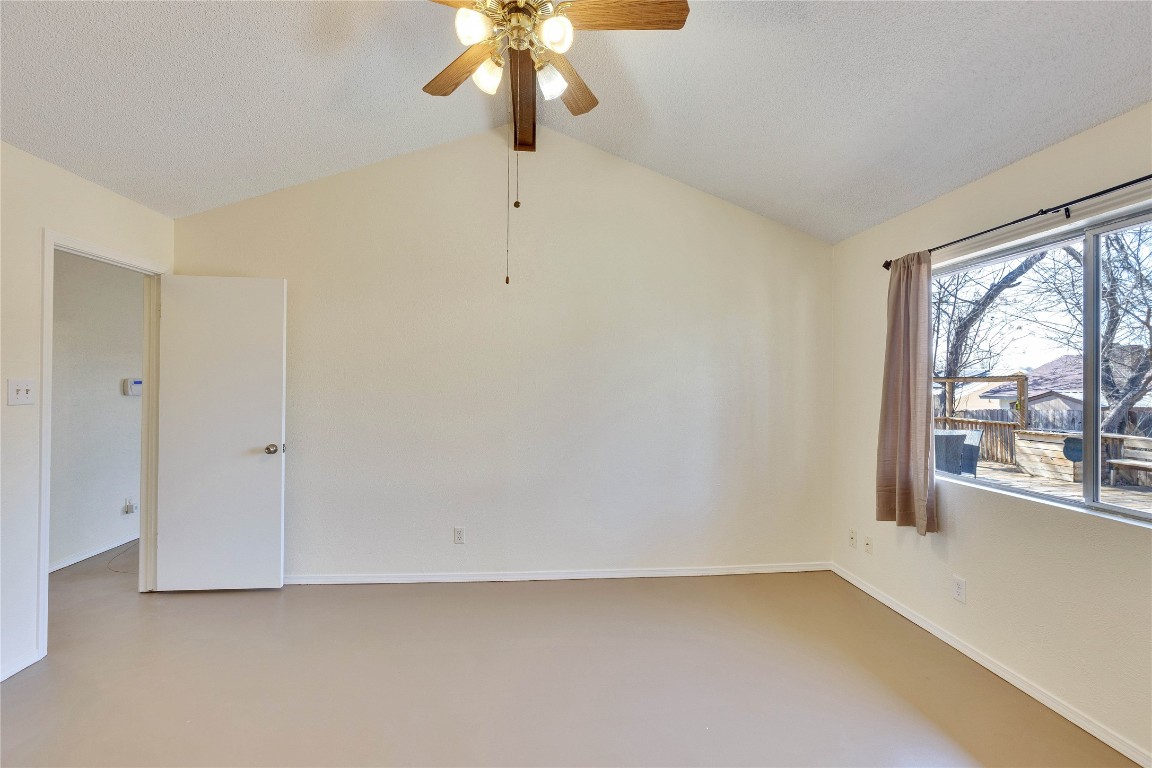 1002 Bodark Lane Austin, TX 78745 - Photo 18 of 35 wooden floor in an empty room with a window