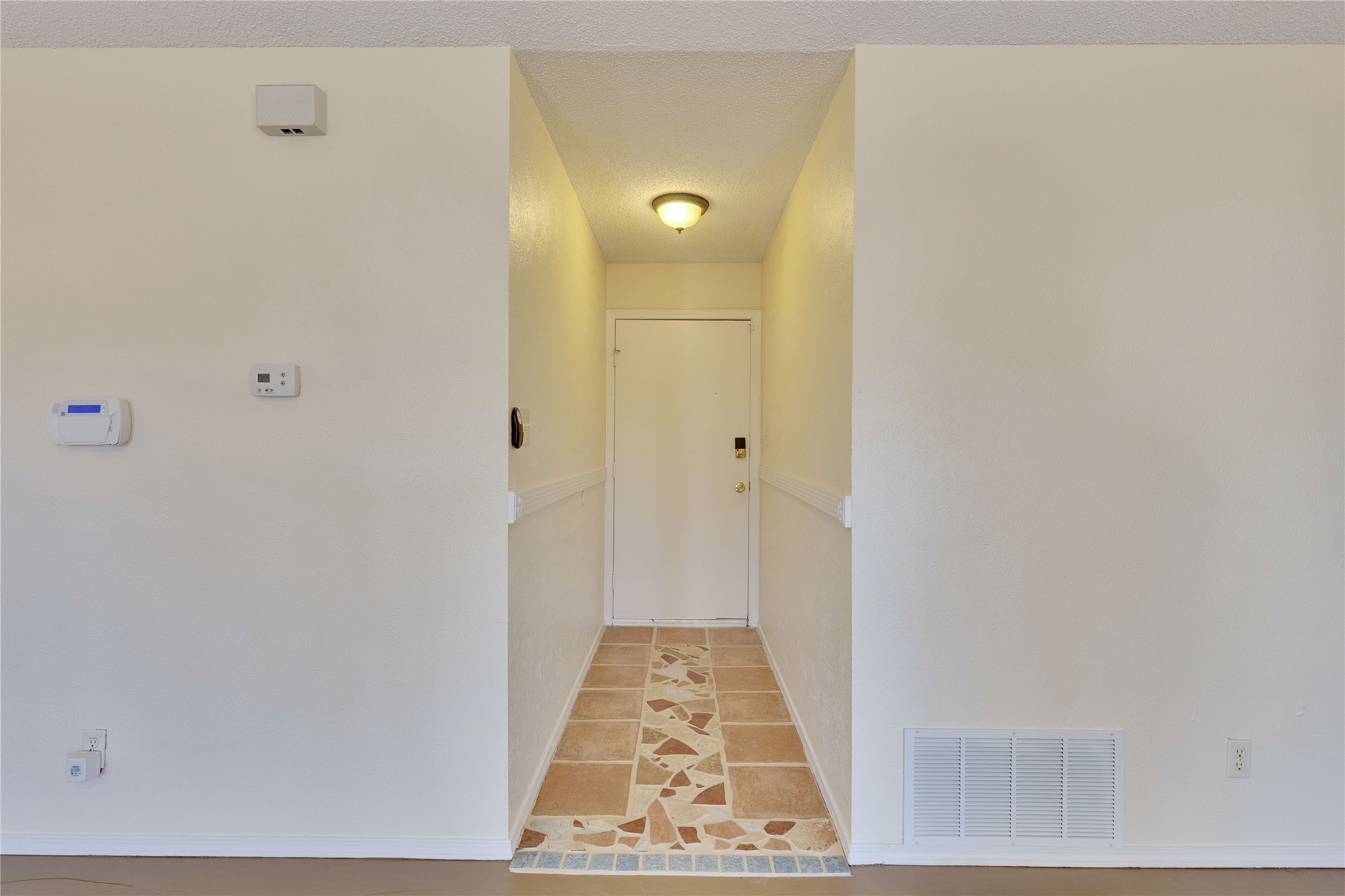 1002 Bodark Lane Austin, TX 78745 - Photo 3 of 35 a view of hallway with wooden floor