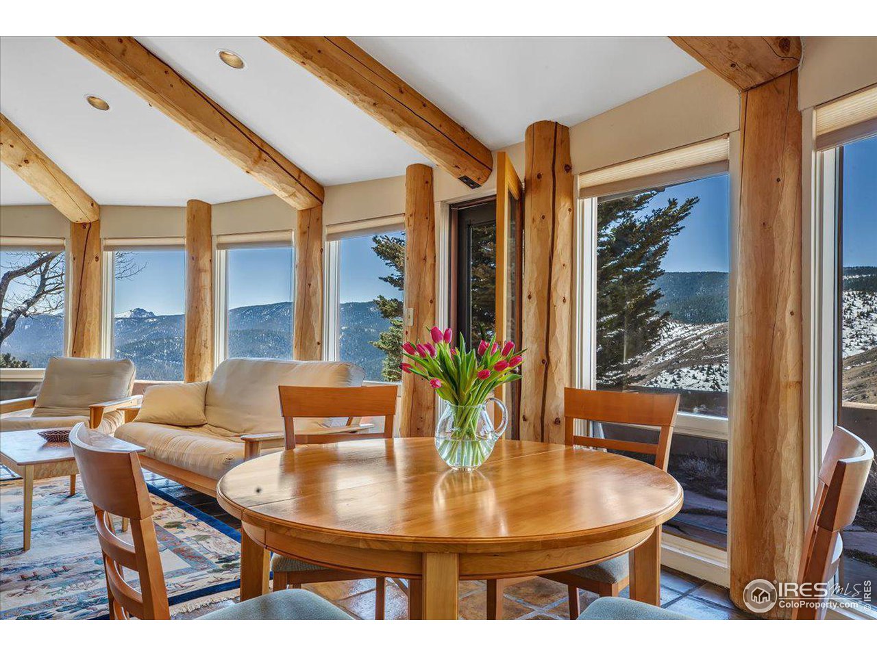 515 Lost Angel Road Boulder, CO 80302 - Photo 6 of 37 a view of a dining room with furniture and window
