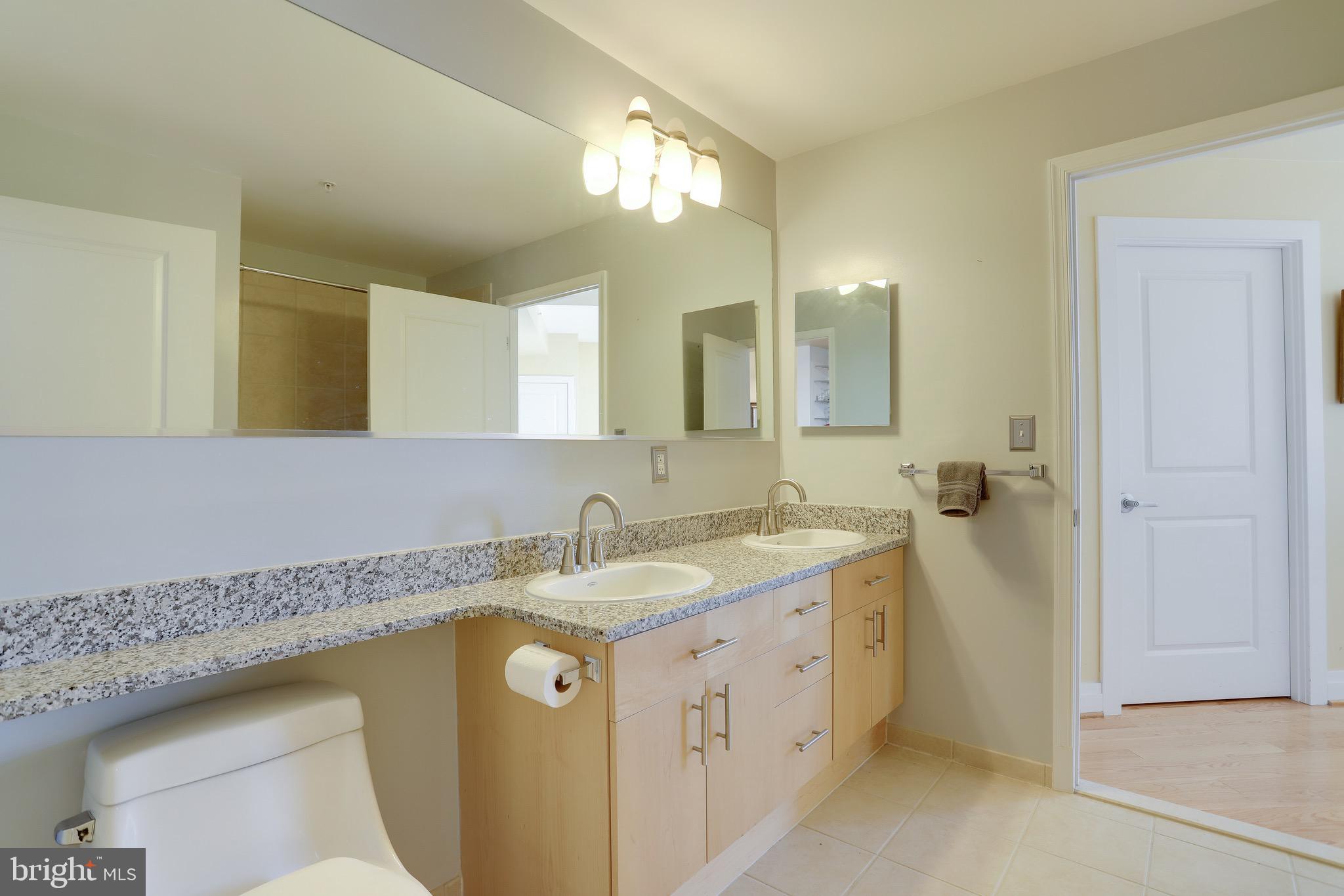 715 6th Street Northwest, Unit 1202 Washington, DC 20001 - Photo 47 of 66 2nd bathroom can be entered via bedroom...