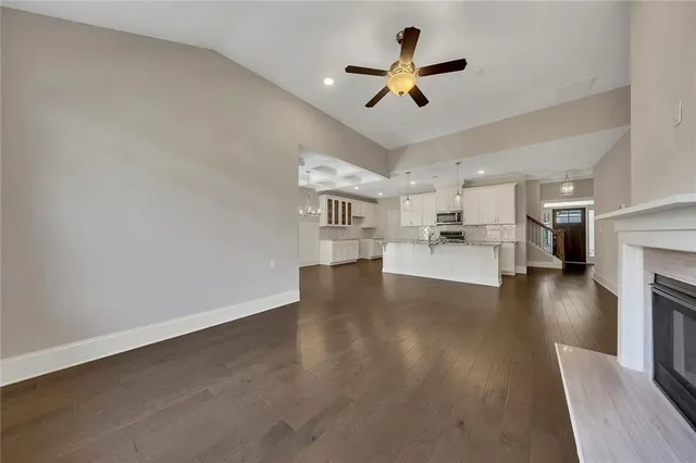 a living room with furniture fireplace and a flat screen tv