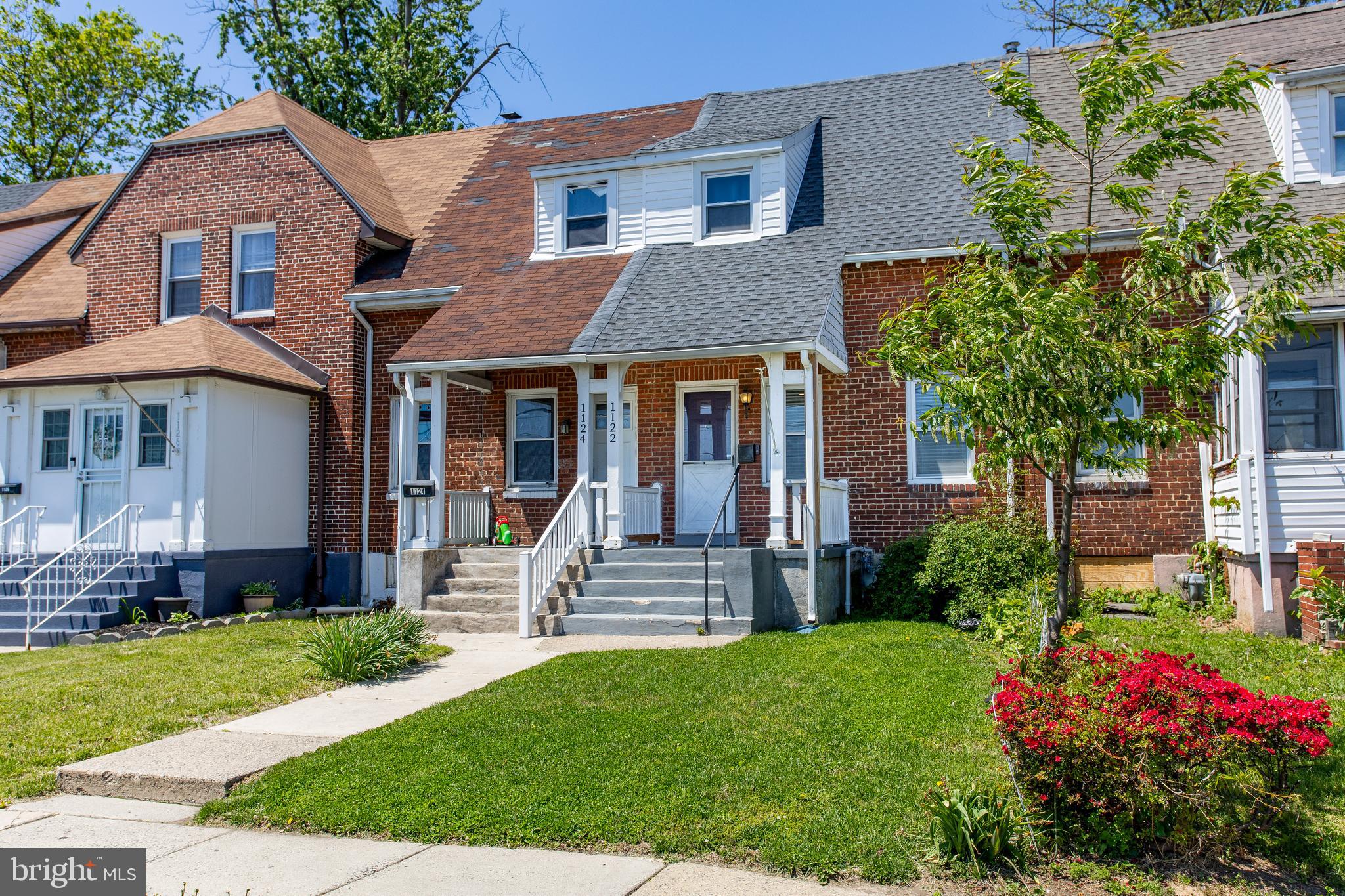 1122 West Ridge Road Marcus Hook, PA 19061 - Photo 3 of 27 front view of a house with a yard