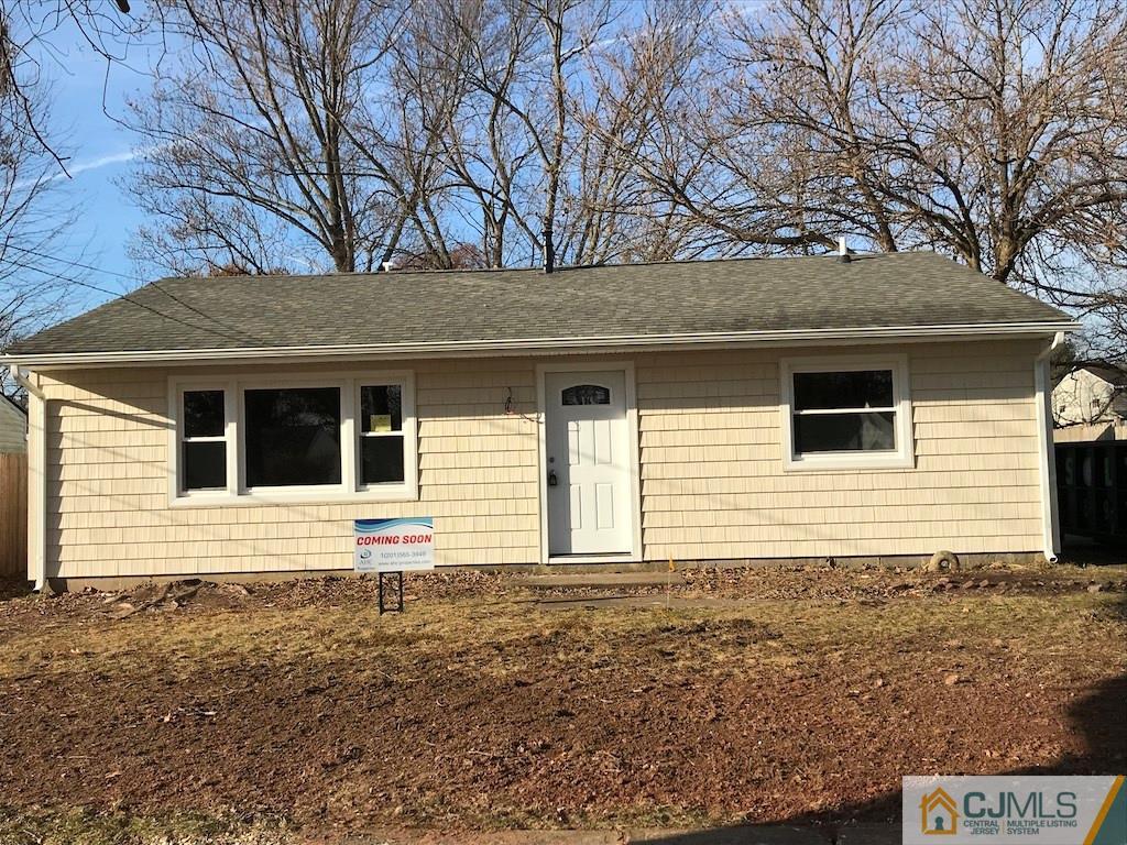 26 Cambridge Road Edison, NJ 08817 - Photo 16 of 17 a front view of a house with yard