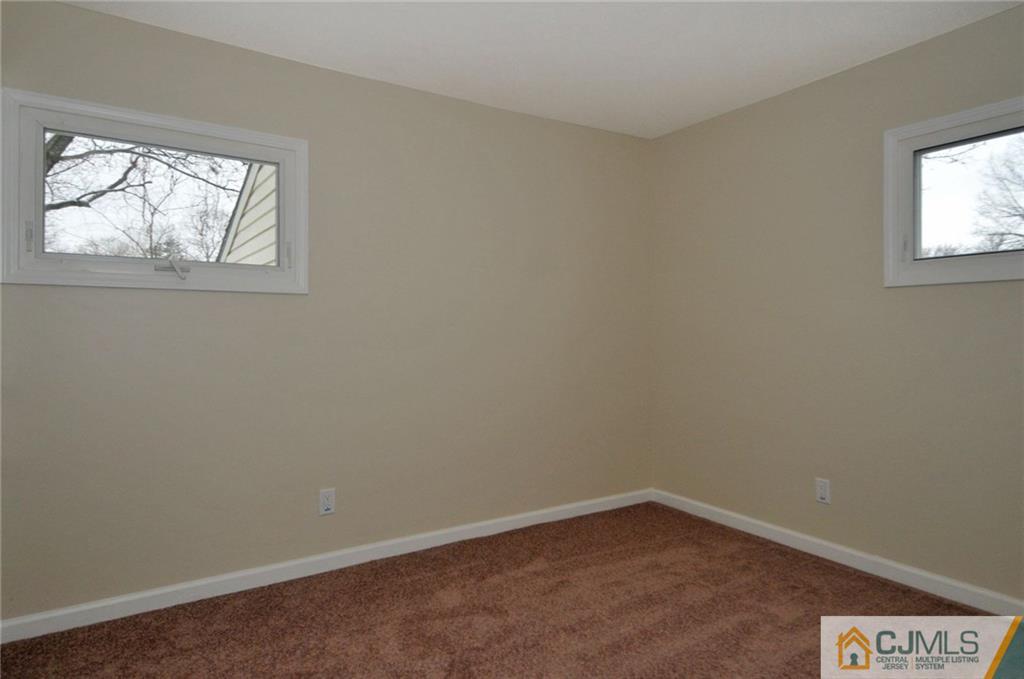 26 Cambridge Road Edison, NJ 08817 - Photo 10 of 17 an empty room with windows