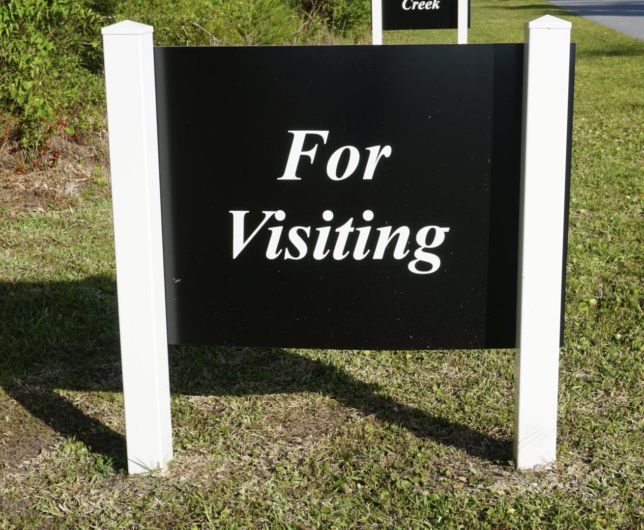 87 Wayne Trail Santa Rosa Beach, FL 32459 - Photo 10 of 11 a view of a sign board