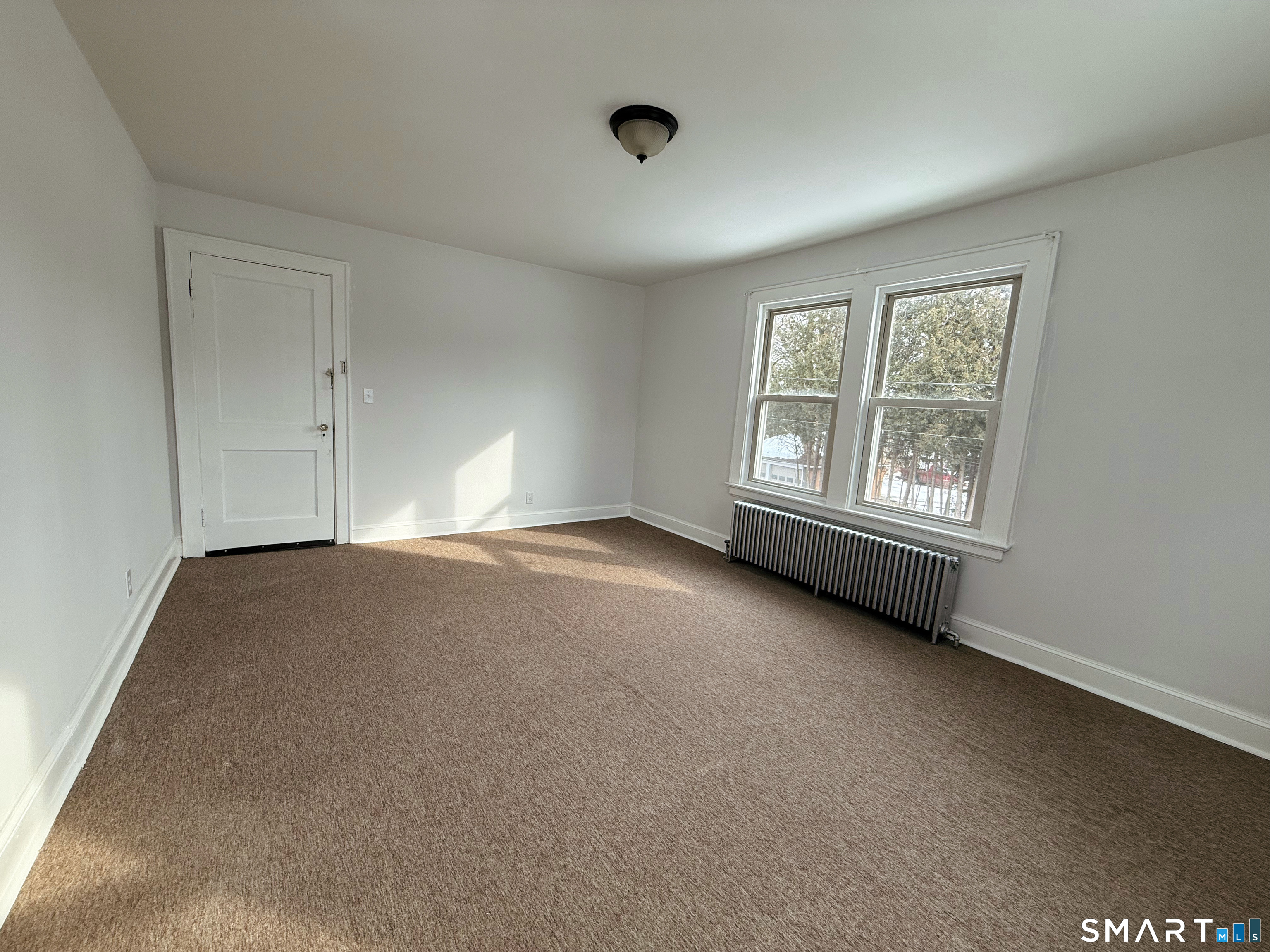 8 Garden Street Naugatuck, CT 06770 - Photo 14 of 14 an empty room with a window
