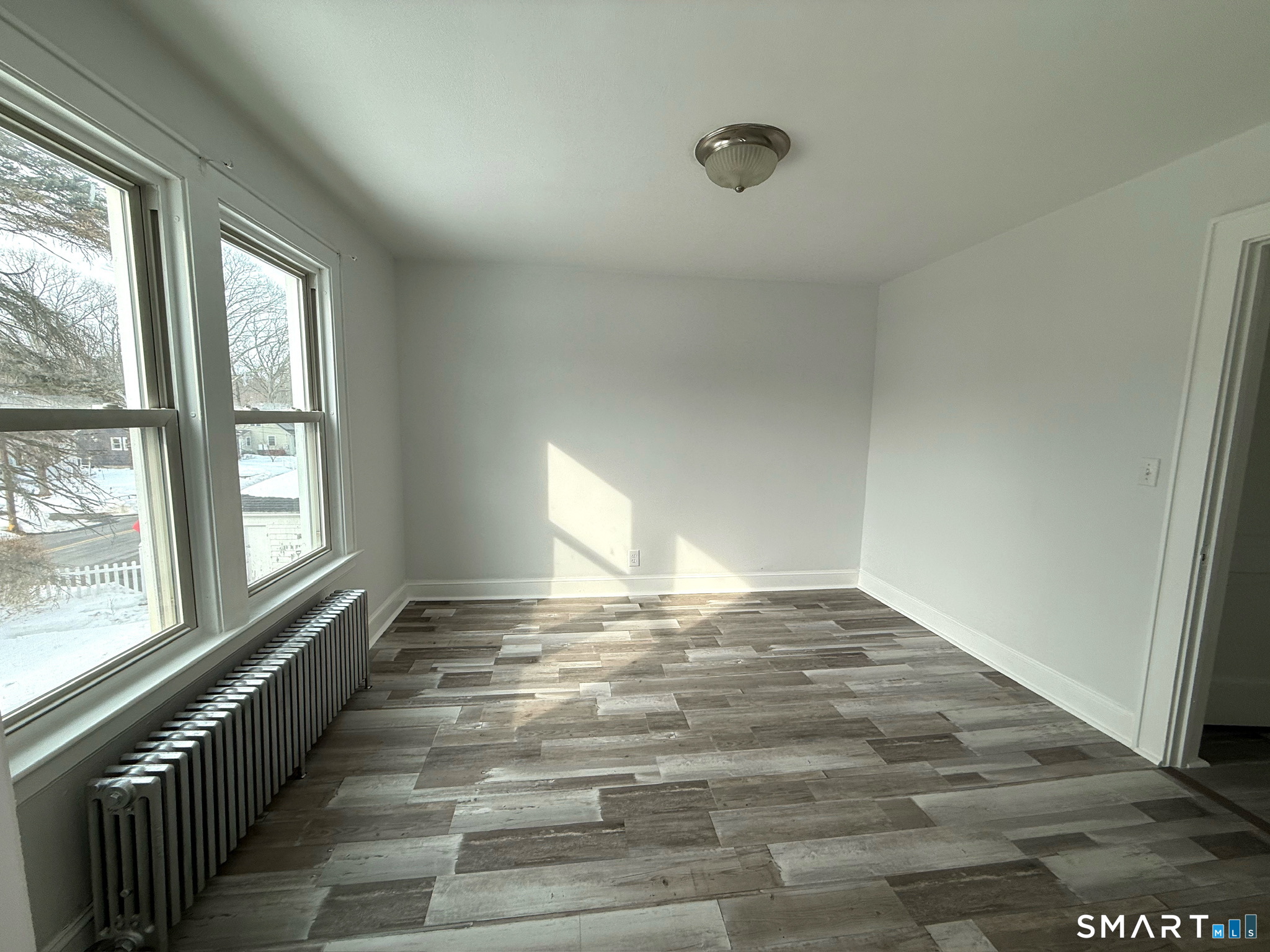 8 Garden Street Naugatuck, CT 06770 - Photo 8 of 14 a view of an empty room and window