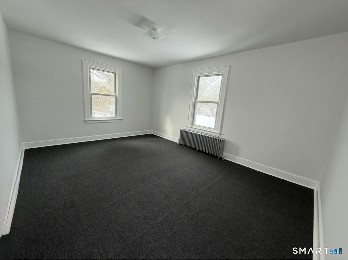 8 Garden Street Naugatuck, CT 06770 - Photo 9 of 14 a view of a room that has a window in it