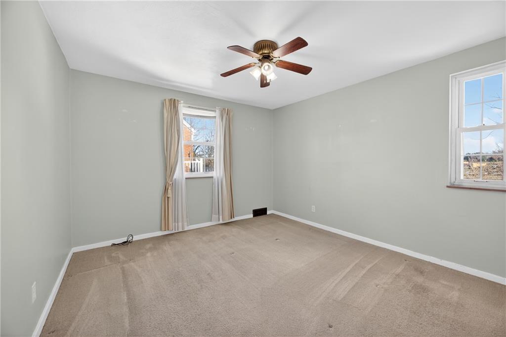 3553 Oakleaf Road Pittsburgh, PA 15227 - Photo 11 of 33 Main floor primary bedroom.