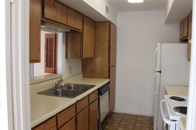 a bathroom with a sink and a large mirror