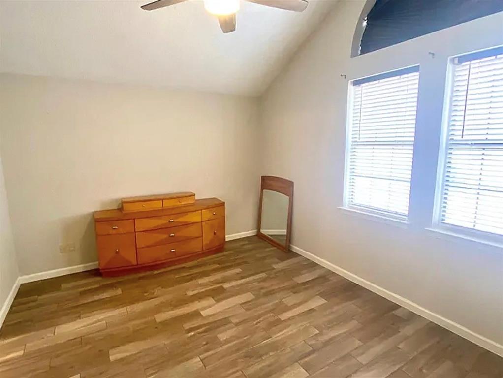 2614 Timberview Circle Corinth, TX 76210 - Photo 11 of 18 a room with a bed and a window