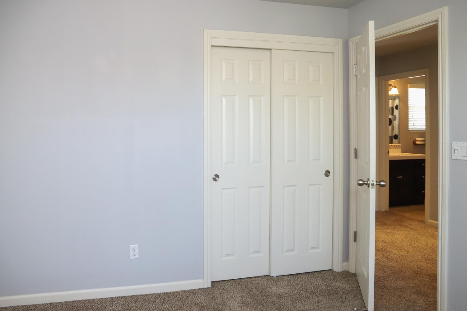 3511 Generosity Way Clovis, CA 93619 - Photo 17 of 26 an empty room with closet and a bathroom