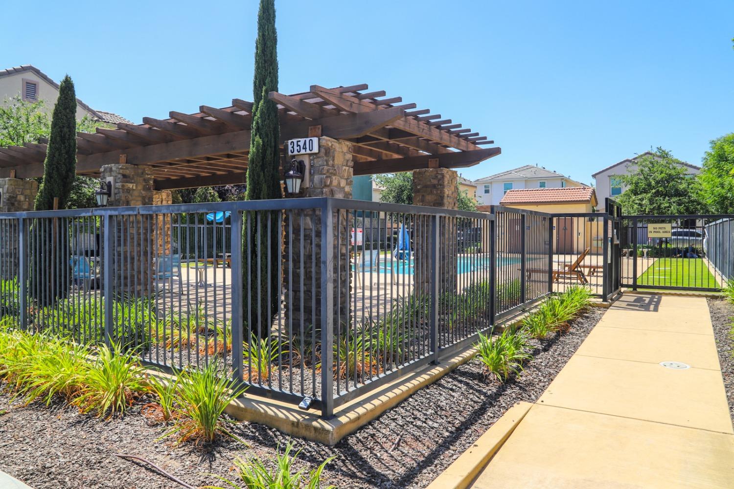 3511 Generosity Way Clovis, CA 93619 - Photo 25 of 26 a view of a balcony with a potted plant