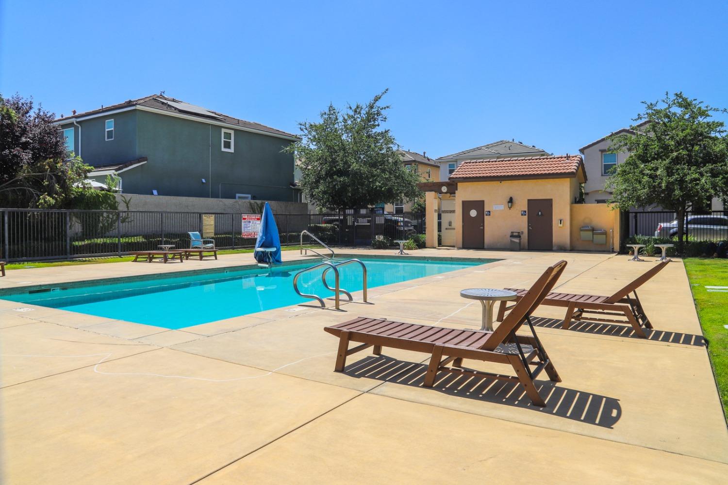 3511 Generosity Way Clovis, CA 93619 - Photo 26 of 26 a view of a house with swimming pool and porch