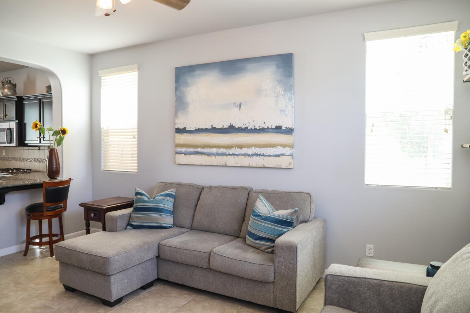 3511 Generosity Way Clovis, CA 93619 - Photo 10 of 26 a living room with furniture and a window