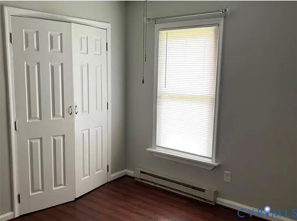 4513 Norborne Road Richmond, VA 23234 - Photo 6 of 10 Rich wood-finish flooring, light grey wall paint,
