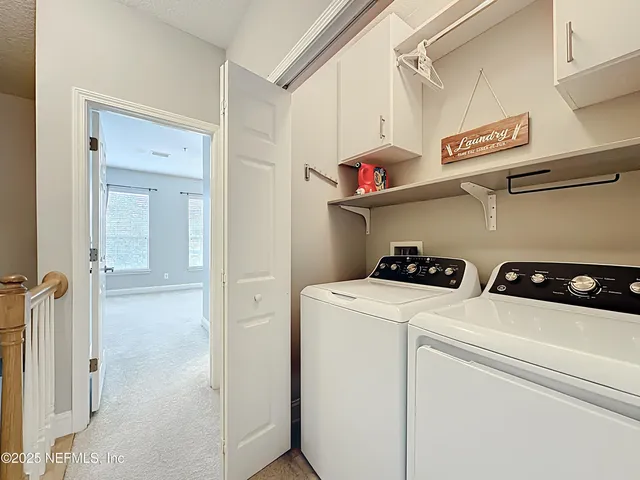 a view of a room with a large window