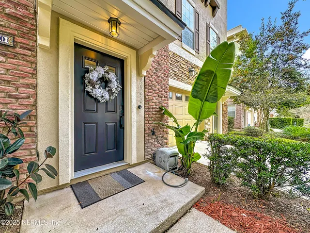 a front view of a house with a porch