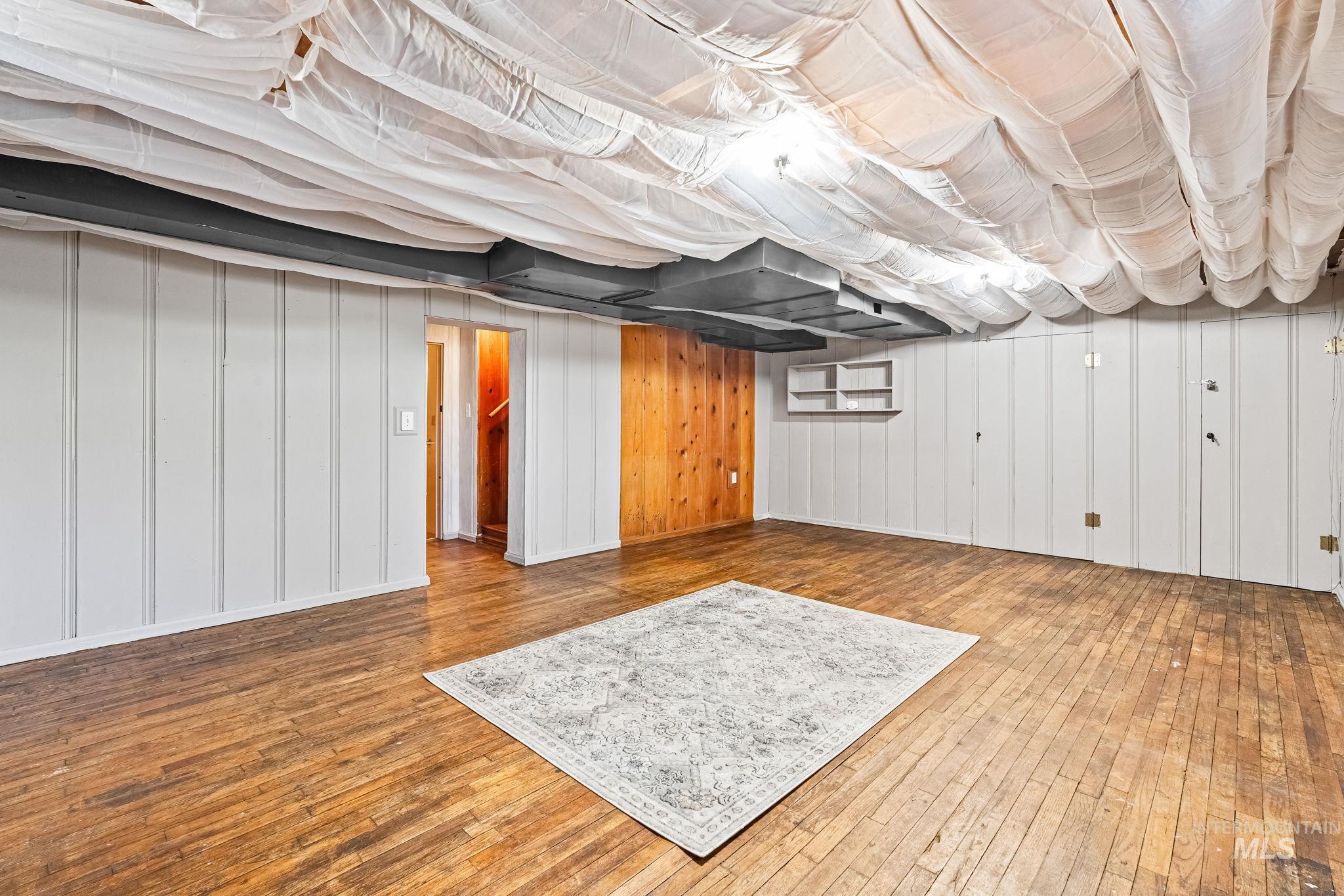 404 North Allumbaugh Street Boise, ID 83704 - Photo 14 of 31 Finished below grade area with hardwood / wood-style flooring