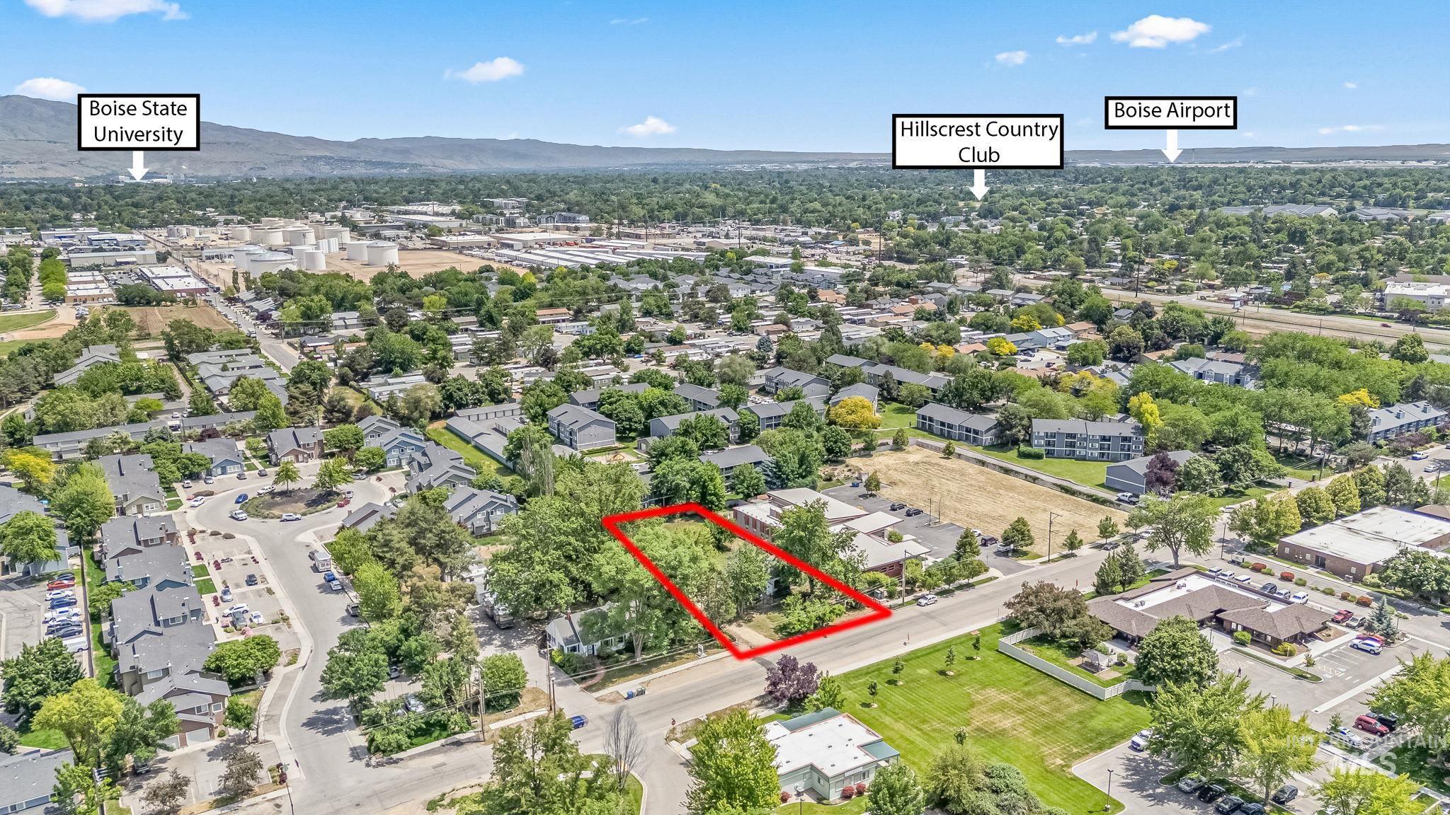 404 North Allumbaugh Street Boise, ID 83704 - Photo 4 of 31 Aerial view of property's location featuring property boundaries highlighted and a mountainous background