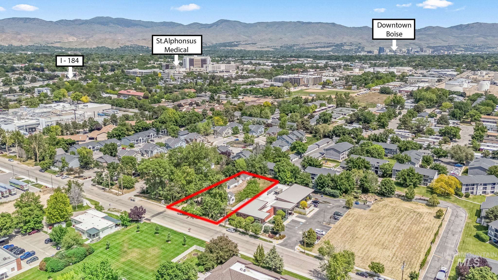 404 North Allumbaugh Street Boise, ID 83704 - Photo 5 of 31 Aerial view of property's location with property parcel outlined and a mountainous background