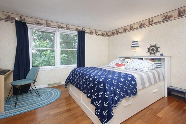 9 Abbott Road Maynard, MA 01754 - Photo 26 of 36 a bedroom with a large bed and a window