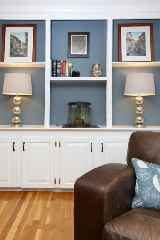 9 Abbott Road Maynard, MA 01754 - Photo 8 of 36 a bedroom with a bed and a lamp on dresser
