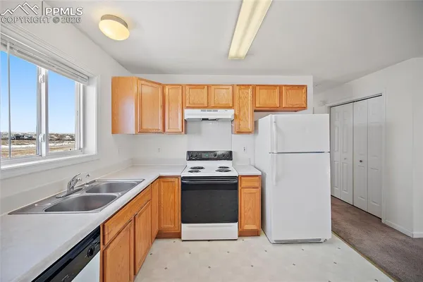 a view of a livingroom with a fireplace