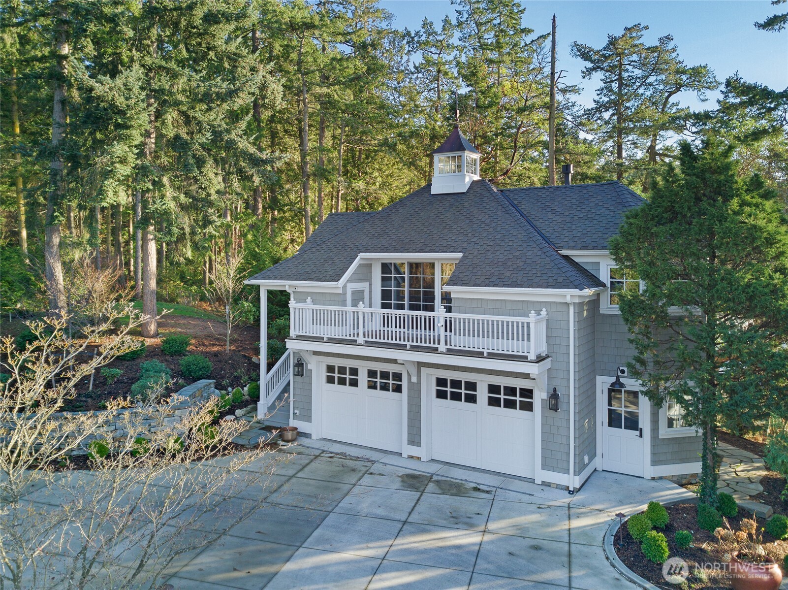 95 Laurel Point Lane Friday Harbor, WA 98250 - Photo 26 of 40 a house with a tree in the background