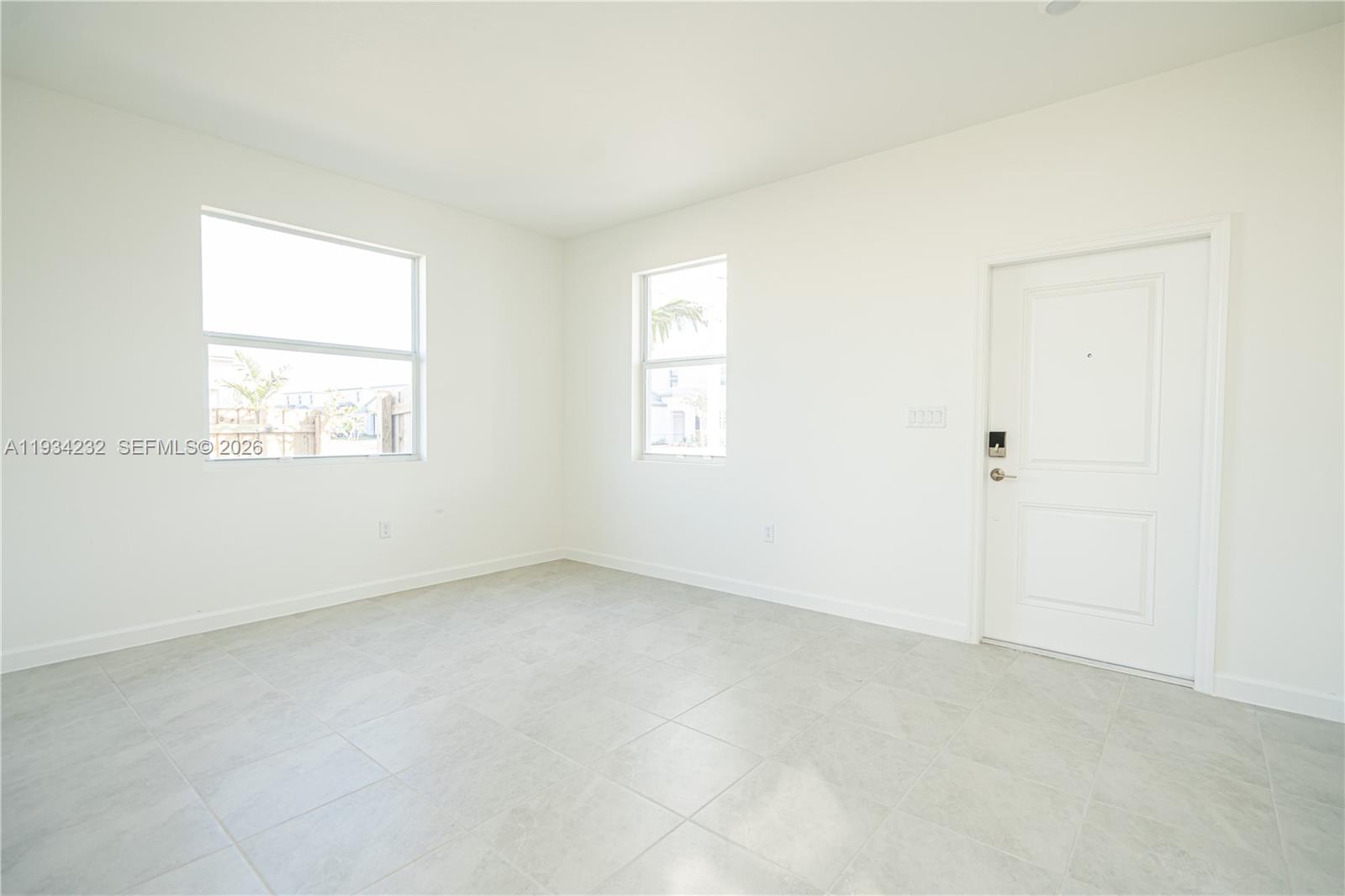 19507 Southwest 339th Terrace Homestead, FL 33034 - Photo 12 of 83 an empty room with windows