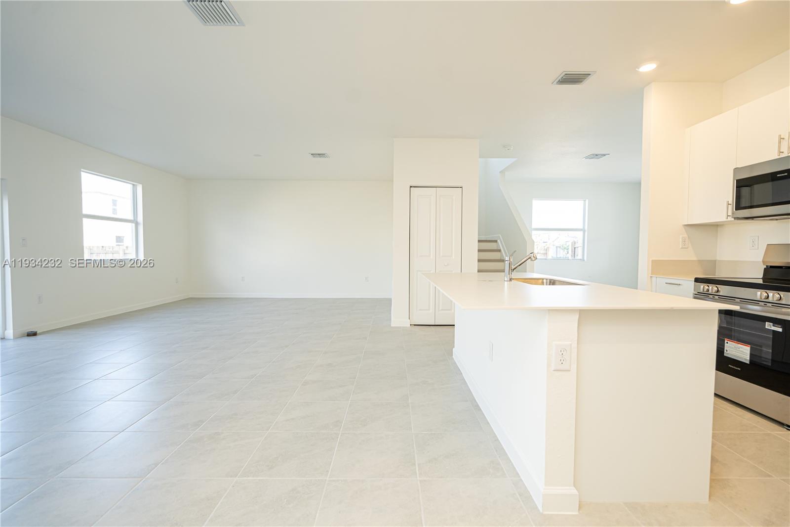 19507 Southwest 339th Terrace Homestead, FL 33034 - Photo 19 of 83 a view of a kitchen cabinets and a counter place