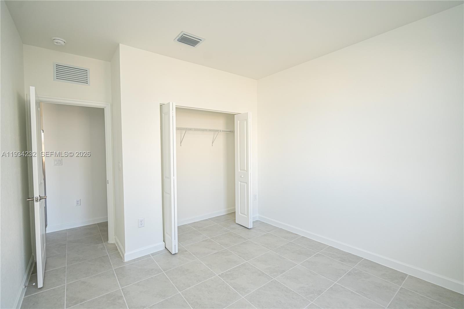 19507 Southwest 339th Terrace Homestead, FL 33034 - Photo 23 of 83 a view of an empty room