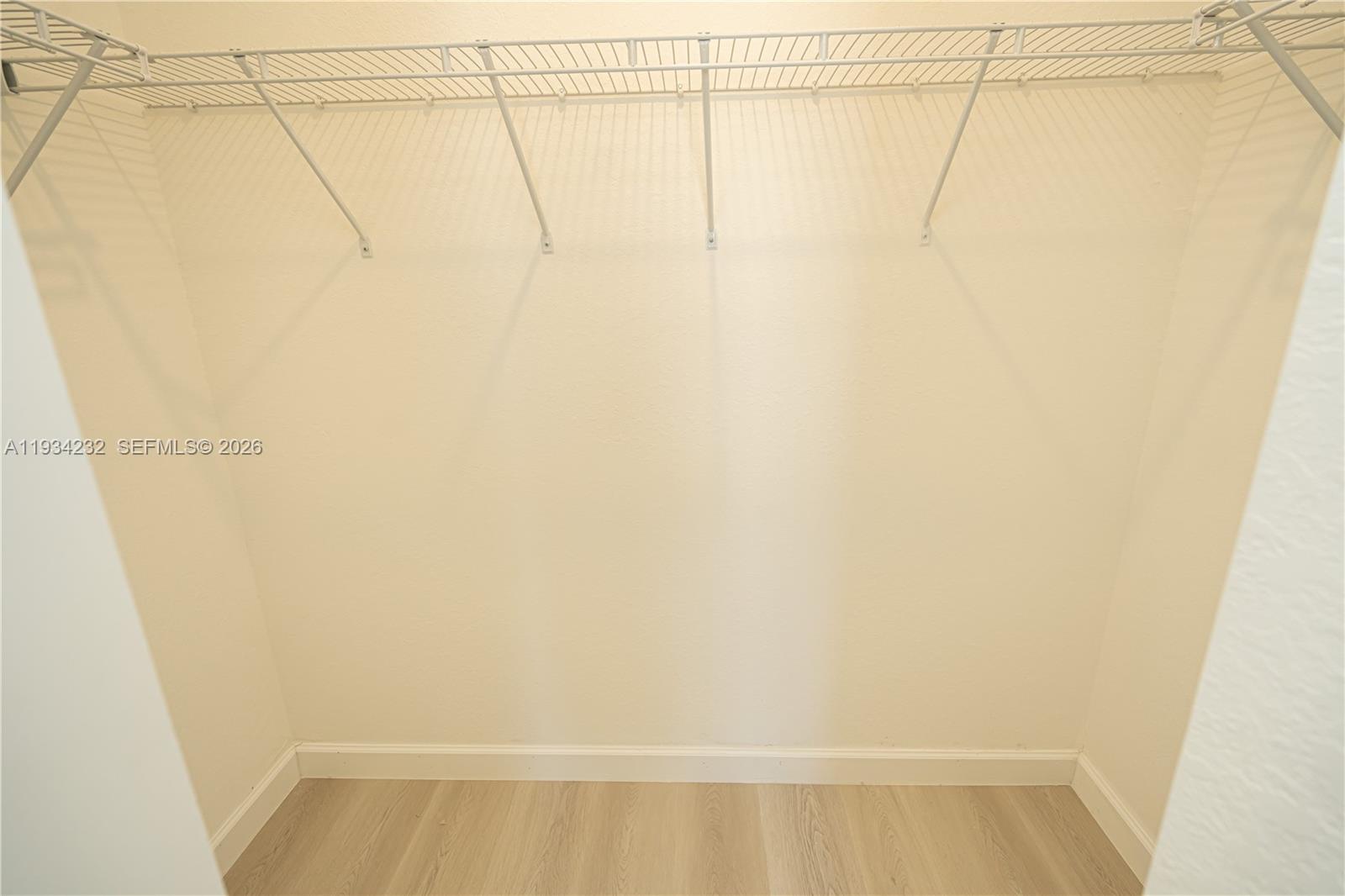 19507 Southwest 339th Terrace Homestead, FL 33034 - Photo 48 of 83 a view of a room with racks on the wall