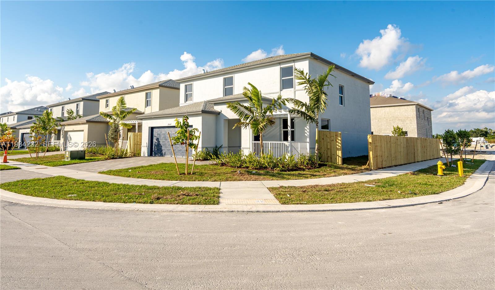19507 Southwest 339th Terrace Homestead, FL 33034 - Photo 75 of 83 a view of a white building with a swimming pool