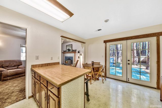a view of a livingroom with furniture and furniture