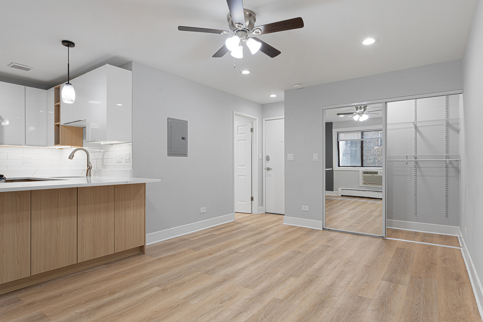 5534 North Kenmore Avenue, Unit 206 Chicago, IL 60640 - Photo 6 of 13 a view of a kitchen with a sink and a refrigerator